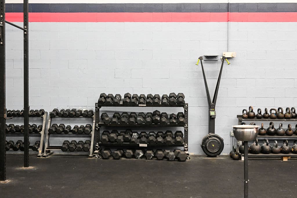 Dumbbell and kettlebell racks at Monument Fitness