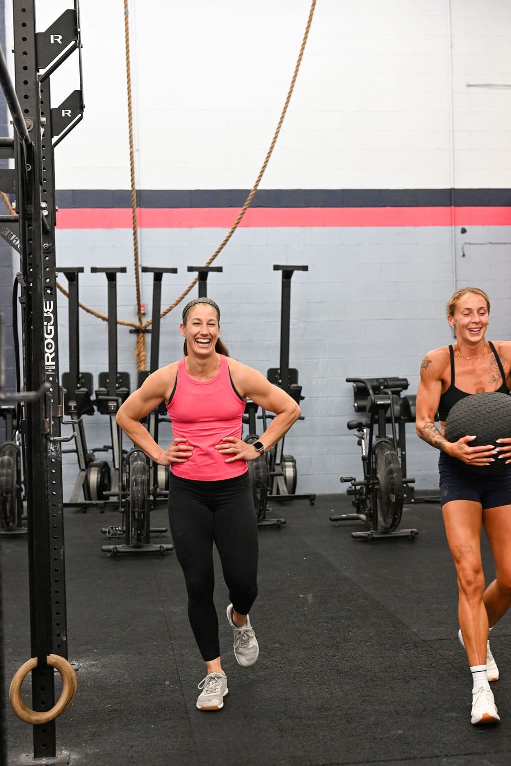 Members laughing together after a workout